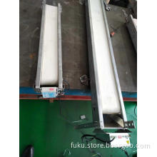 Roller motor conveyor for injection machine